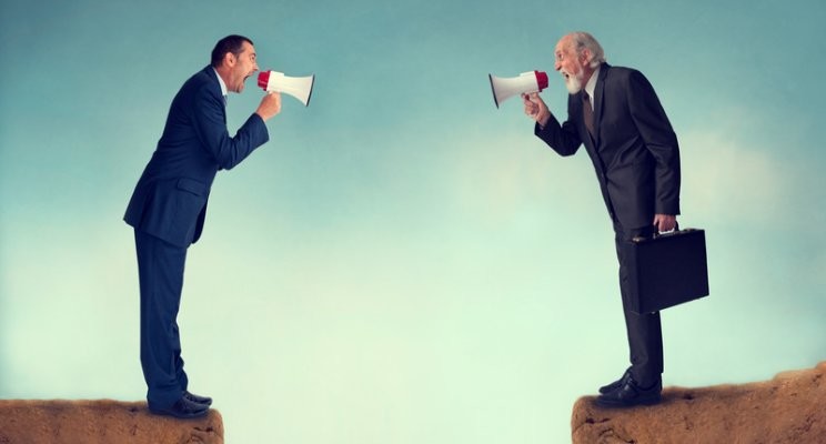 Two men yelling to each other