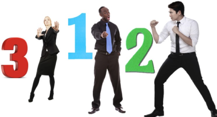 One woman and two men, all in work office outfit in position of fight